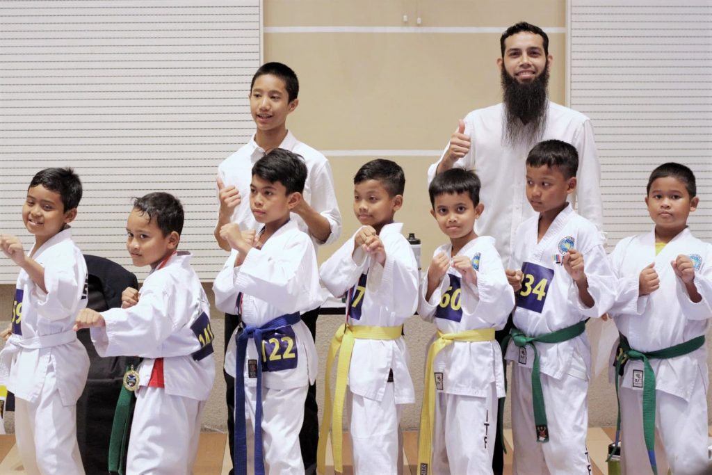 kids-taekwando-white-green-yellow-blue-belt-op